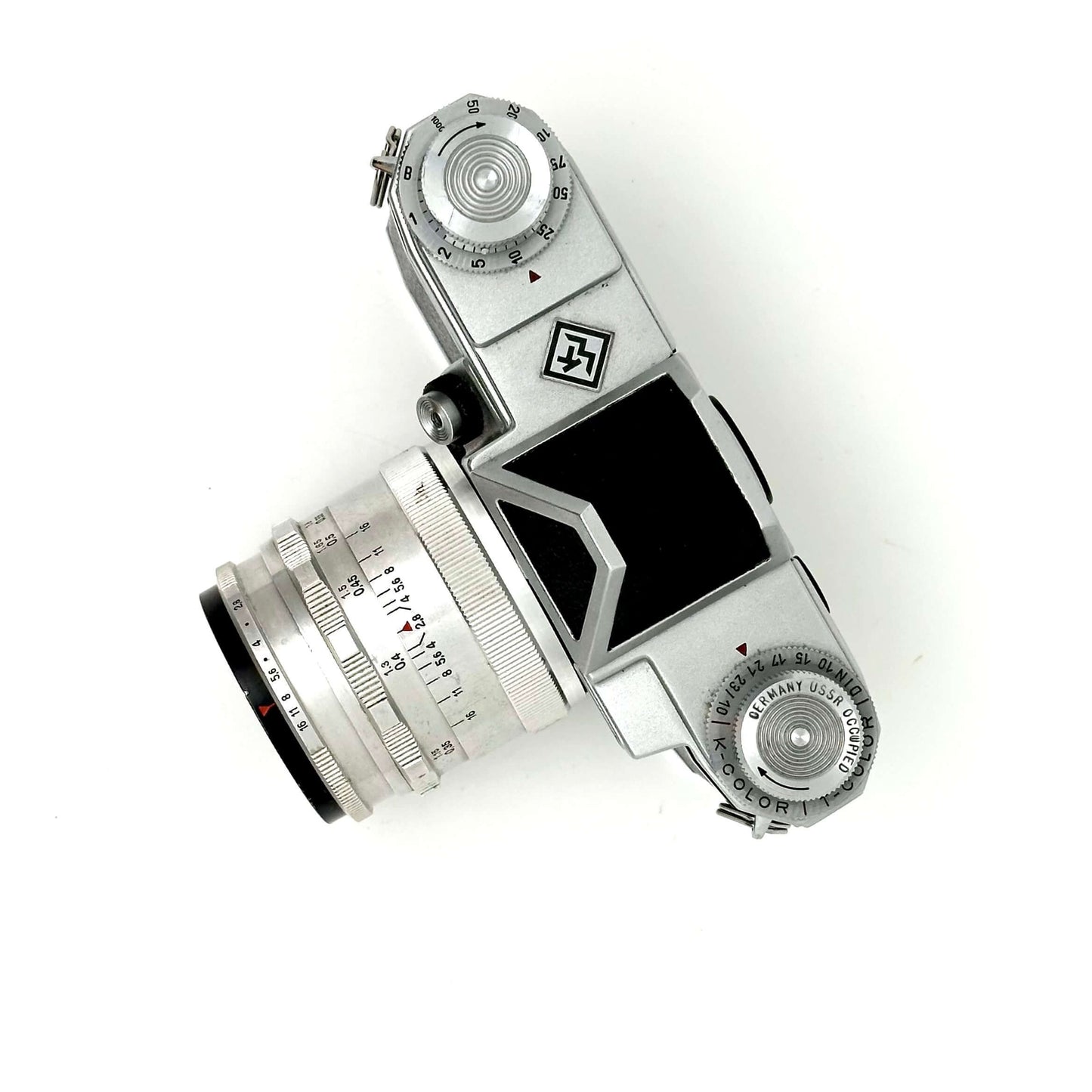 Praktina FX vintage camera with Carl Zeiss Jena Flektogon 35mm f2.8 lens, showing wear and tear.