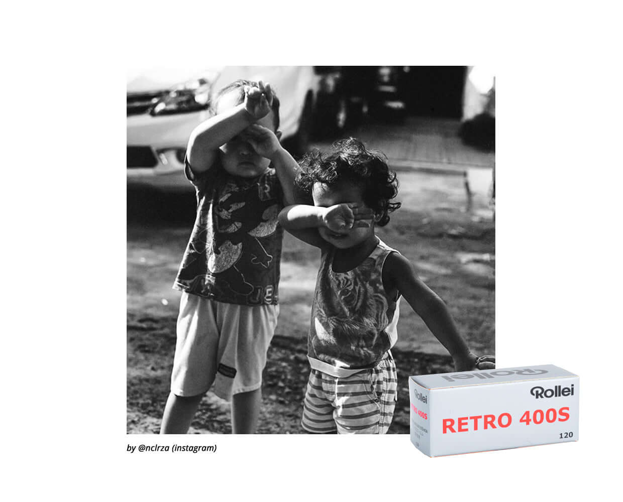 Two children playing outdoors in black and white, alongside a Rollei Retro 400S 120 film box.