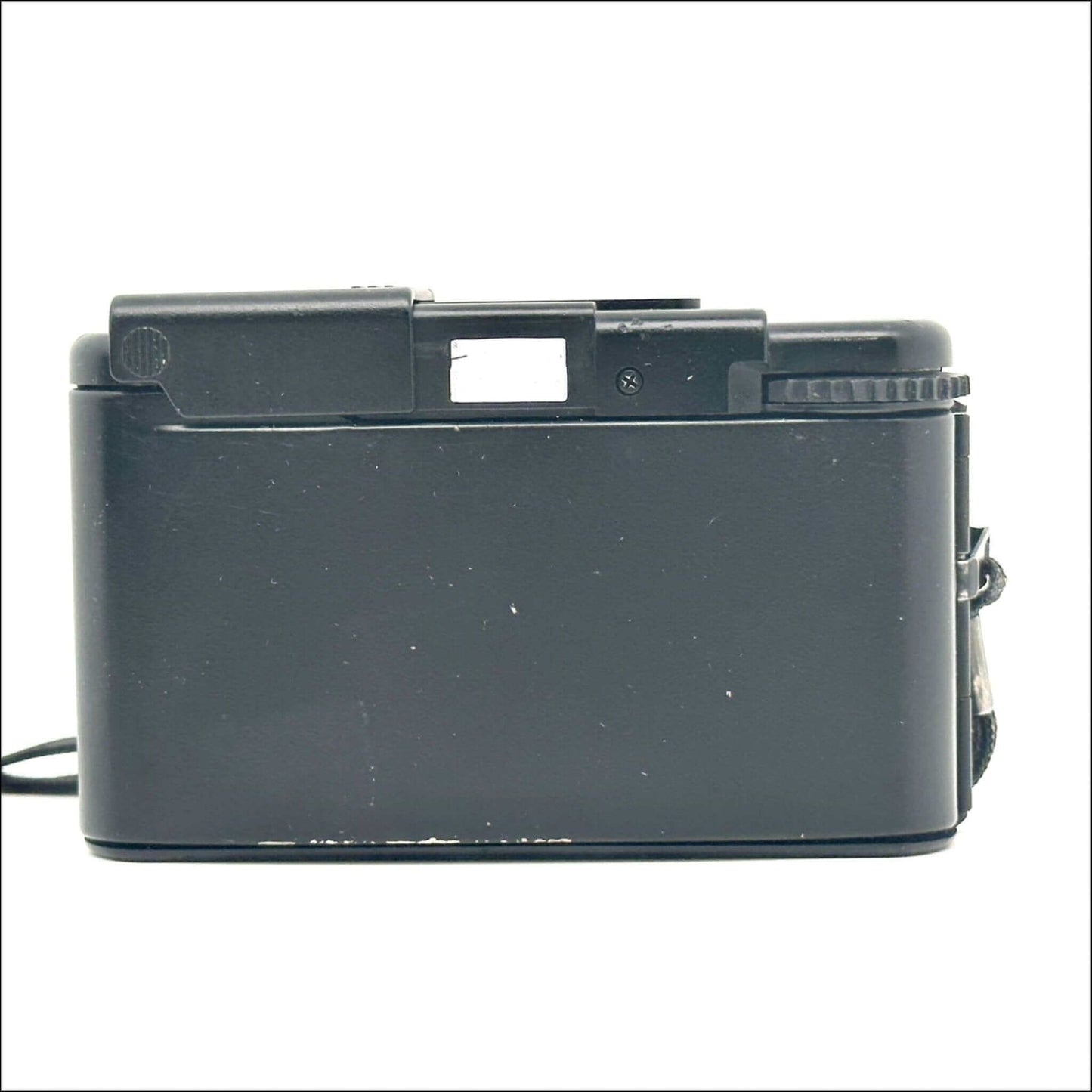 Side view of Olympus XA Used 35mm vintage film camera showing slight paint loss and classic design.
