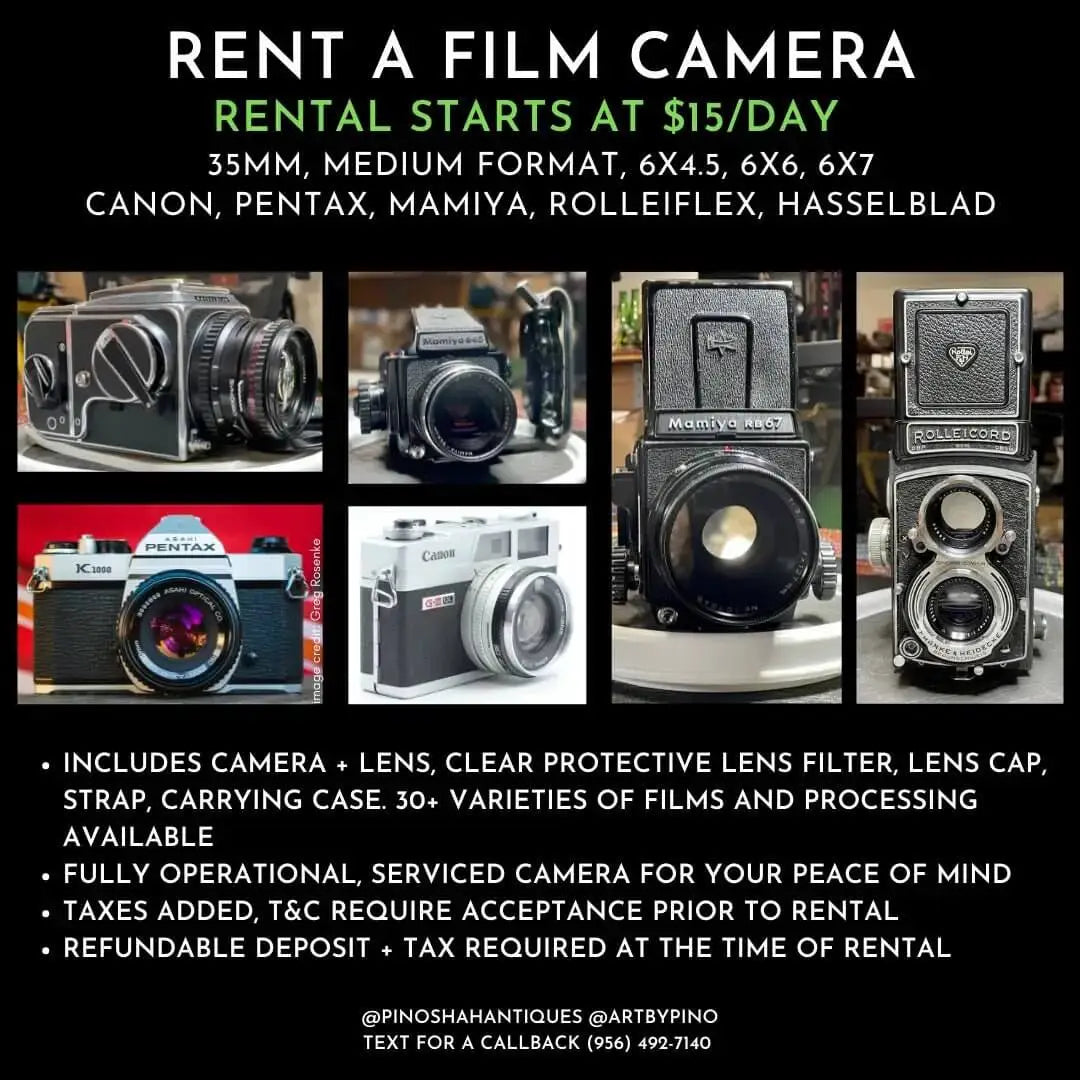 Black and silver canon film camera with a classic, retro design.