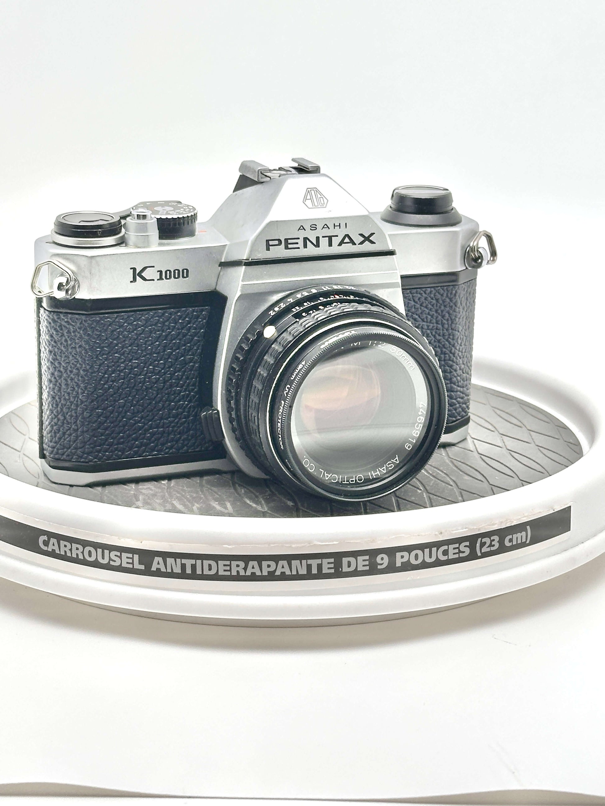 Japanese Asahi Pentax K1000 used 35mm film camera with 50mm f2 lens on display.