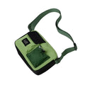 A lime green and black crossbody bag with a grid-patterned mesh pocket, featuring the kletter label on its front.