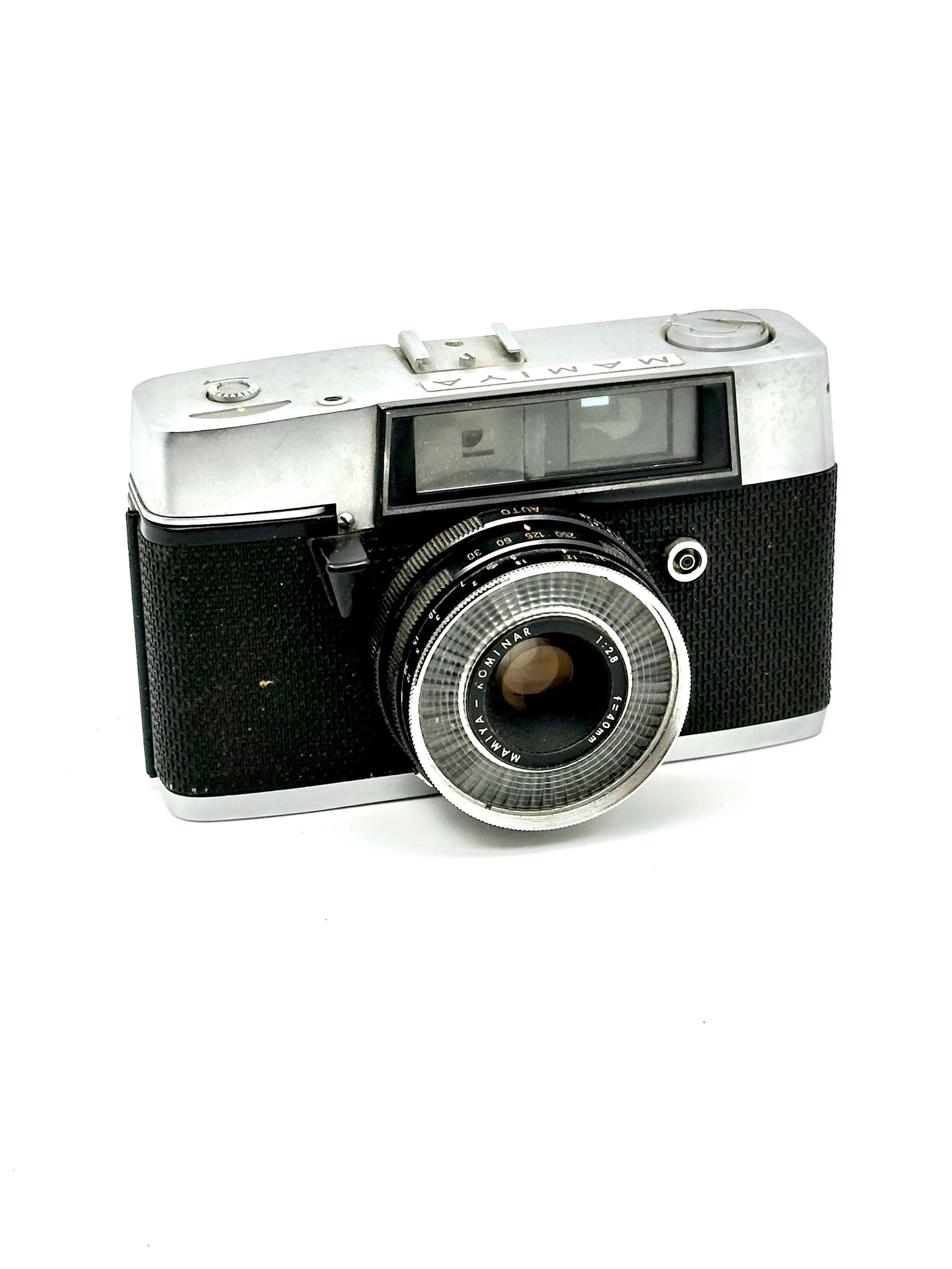 Mamiya Kominar Vintage 35mm Rangefinder Film Camera with 40mm f2.8 lens and Auto mode.