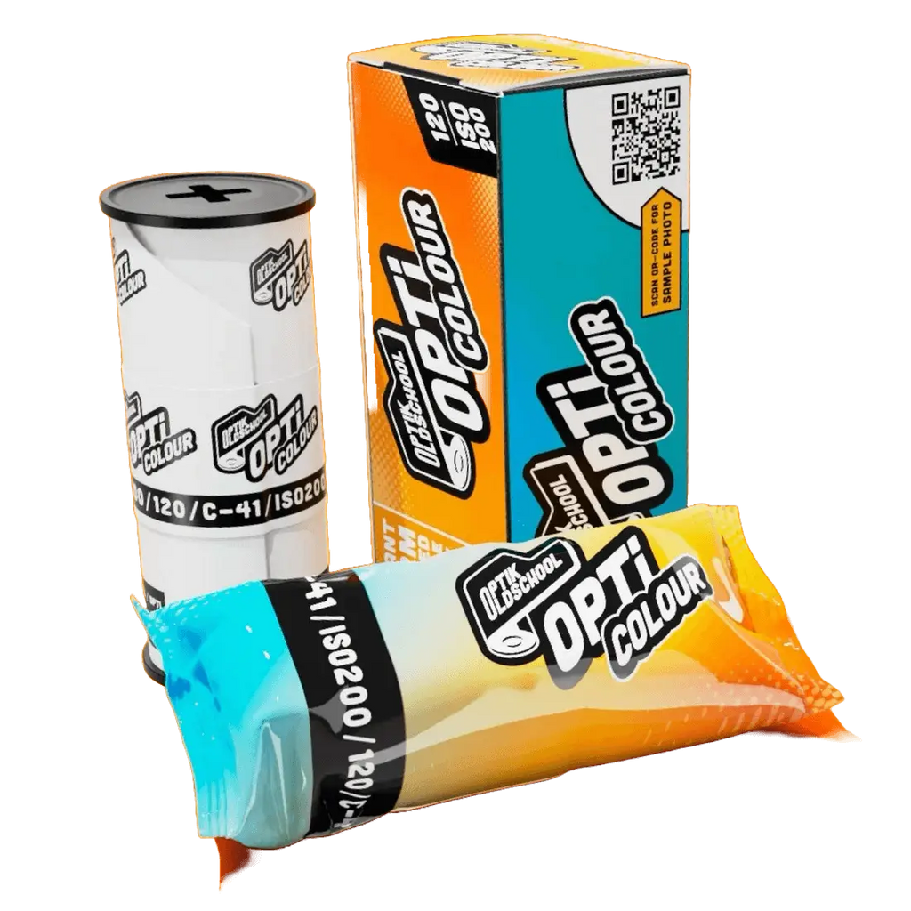 Orange and blue wrapped opti colour film canister with black labeling.