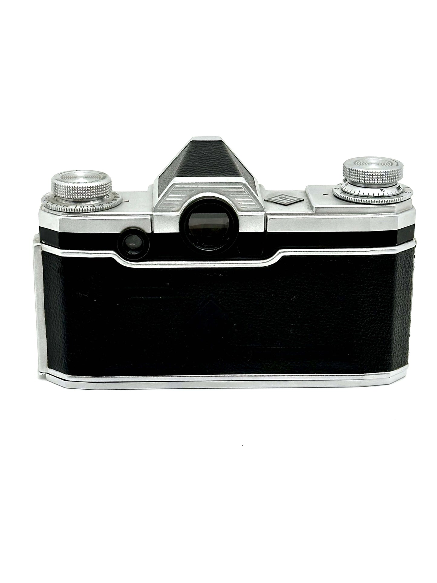 Praktina FX vintage 35mm film camera body in silver and black with lens mount and dials.