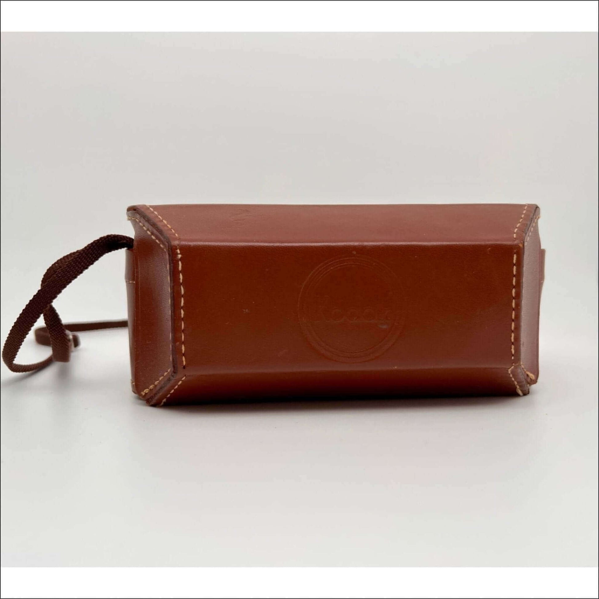 Kodak vintage leather case for 35mm stereo film camera, showing minor stitching wear, sold as is.