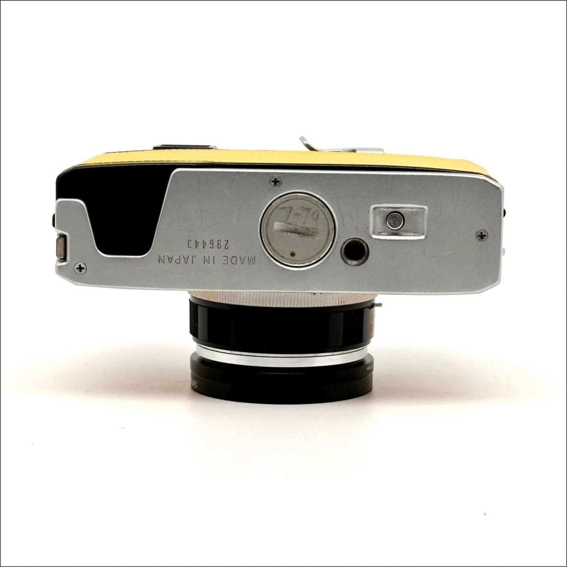 Olympus 35 Rc used yellow rangefinder film camera top view with lens, part of Select CLAd cameras.