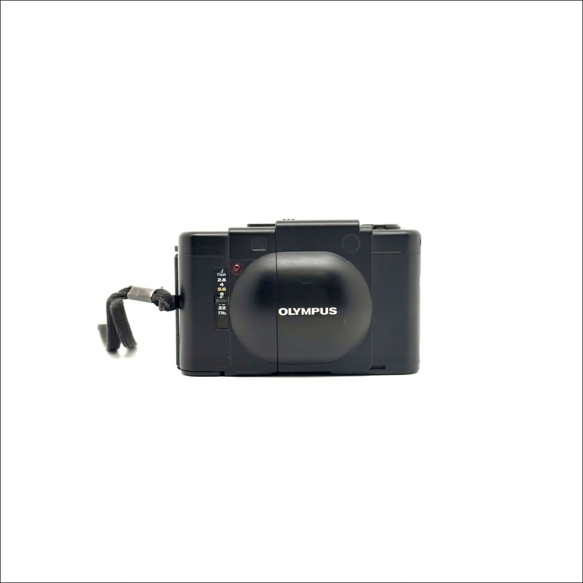 Olympus XA used 35mm vintage film camera in fine working condition, showing minor body scratches.